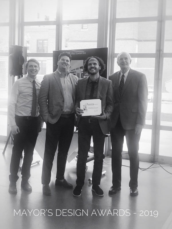 Mayor presenting award for project