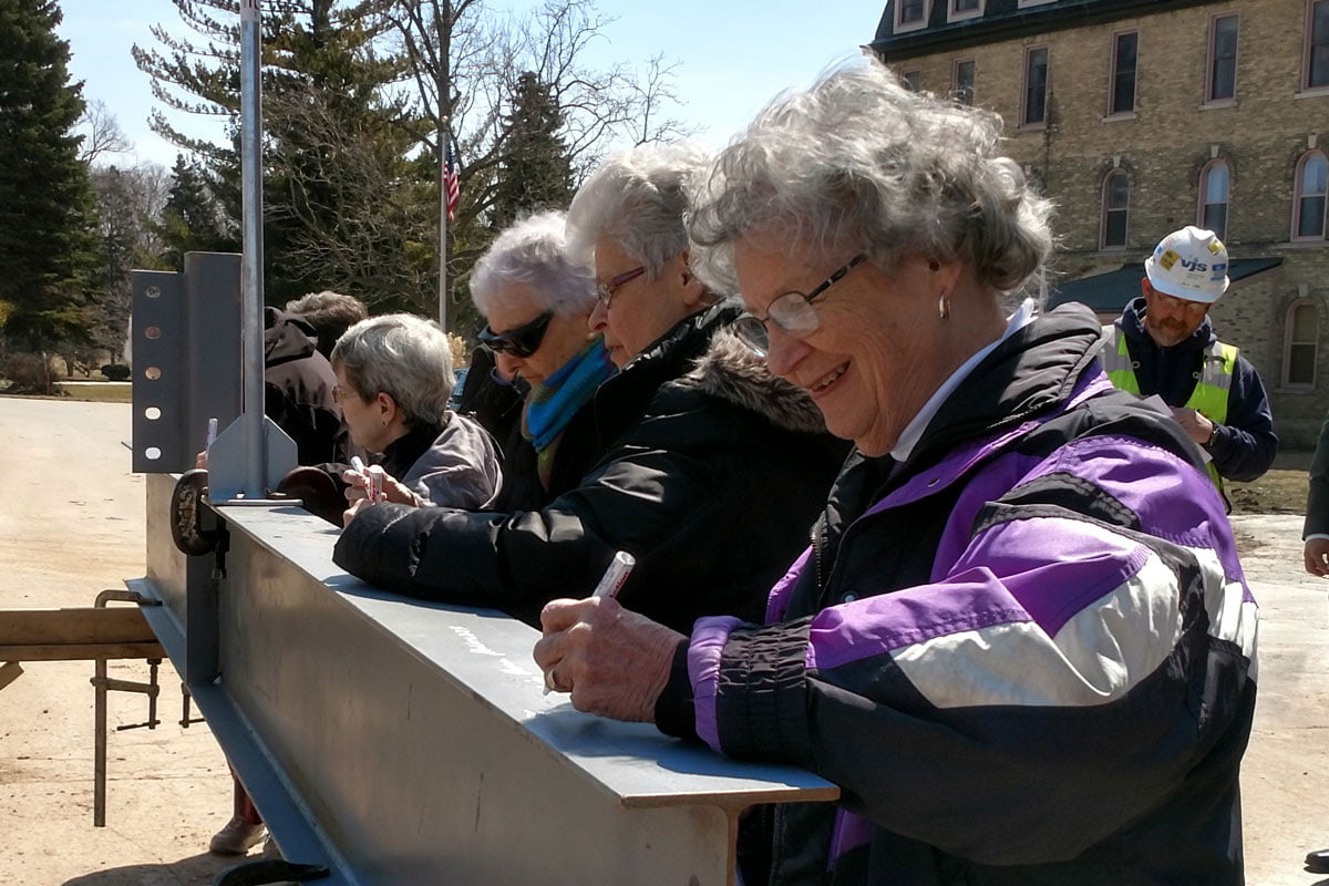 St. Francis beam signing